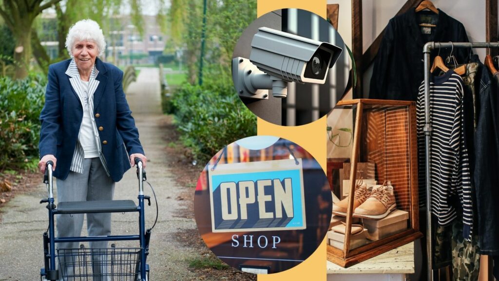 Woman in walker walks in park while being monitored by cameras and shops are open.