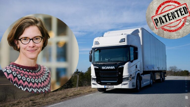 Electric truck driving on a highway.